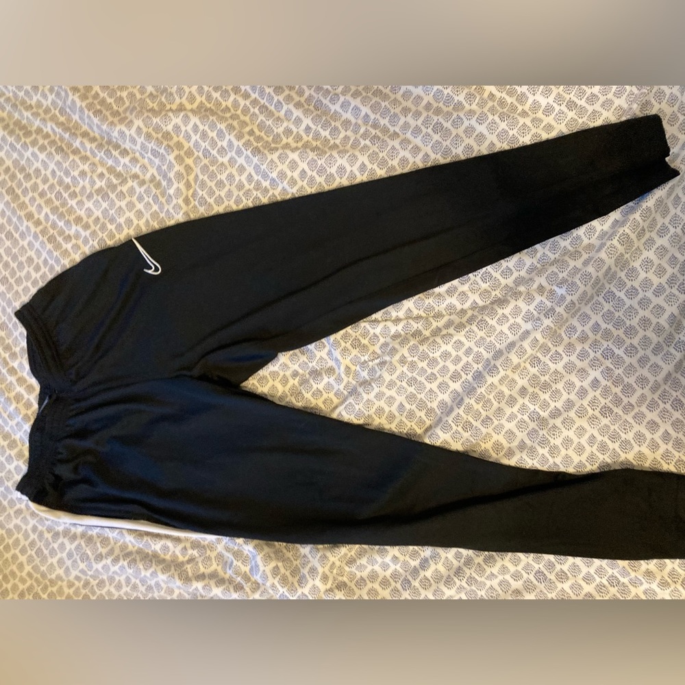Bundle of Nike joggers (one black and one navy blue) in excellent condition.